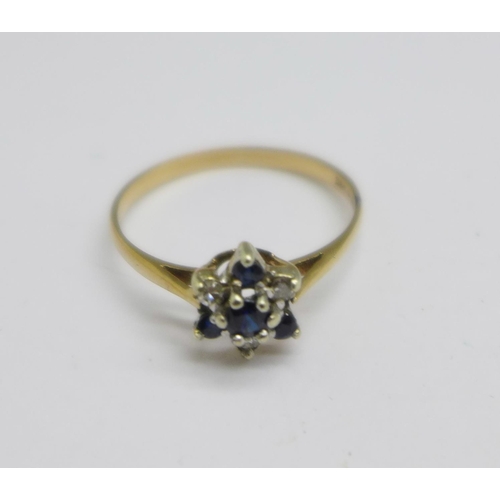 1049 - A 9ct gold, sapphire and diamond cluster ring, 1.2g, P