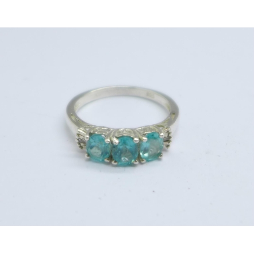 1058 - A silver topaz ring, O