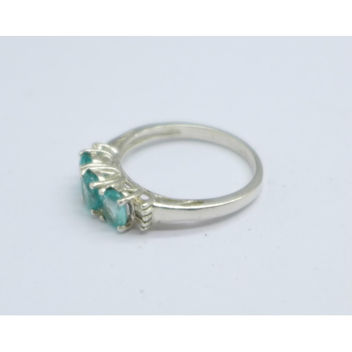 1058 - A silver topaz ring, O