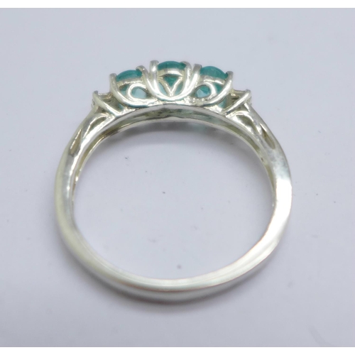 1058 - A silver topaz ring, O