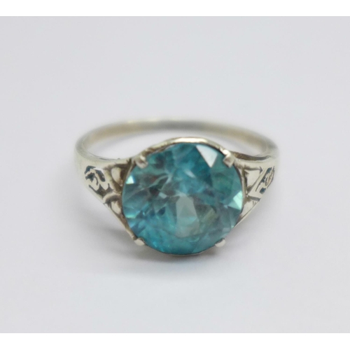 1067 - A white metal set Art Deco ring with natural blue zircon, approximately 4.1carats in weight, size L,... 