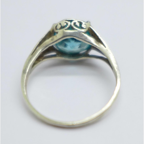 1067 - A white metal set Art Deco ring with natural blue zircon, approximately 4.1carats in weight, size L,... 