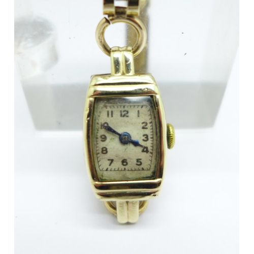 1082 - A 9ct gold cased lady's wristwatch with 9ct gold bracelet strap, weight without movement 8.8g