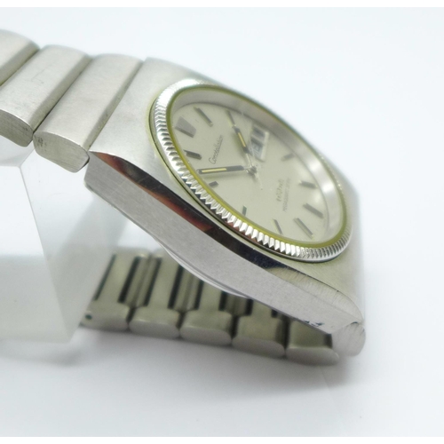 1100 - An Omega Constellation Megaquartz 32 KHz wristwatch, the case back bears inscription dated 1976