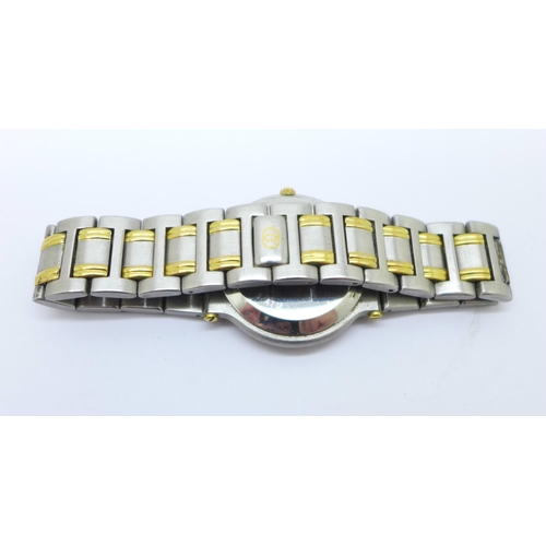 1101 - A yellow metal and stainless steel Gucci dress wristwatch