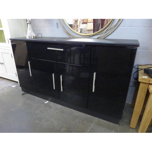 1558 - A black high gloss sideboard  *This lot is subject to VAT