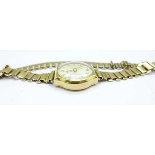 1107 - A lady's 9ct gold cased Vertex wristwatch on a 9ct gold bracelet strap, weight without movement 15.5... 