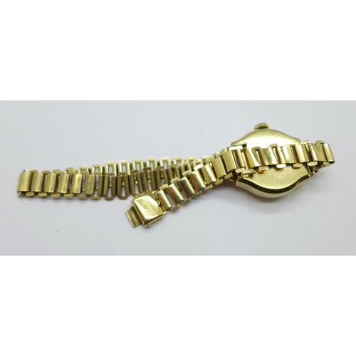 1107 - A lady's 9ct gold cased Vertex wristwatch on a 9ct gold bracelet strap, weight without movement 15.5... 