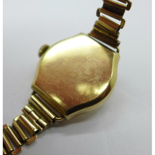 1107 - A lady's 9ct gold cased Vertex wristwatch on a 9ct gold bracelet strap, weight without movement 15.5... 