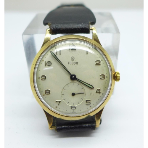 1108 - A 9ct gold cased Rolex Tudor wristwatch, with London Transport related inscription, with guarantee p... 