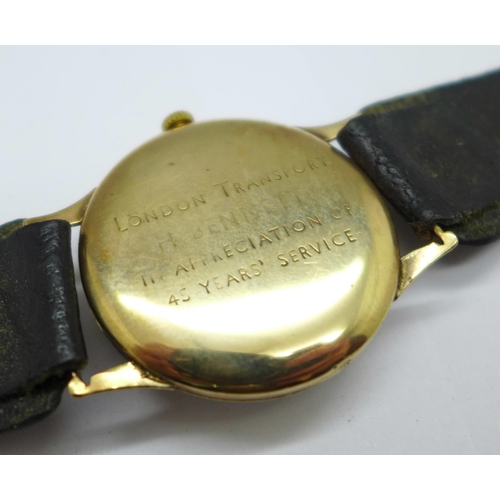 1108 - A 9ct gold cased Rolex Tudor wristwatch, with London Transport related inscription, with guarantee p... 