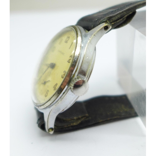 1109 - A Garrard wristwatch, the case back bears inscription