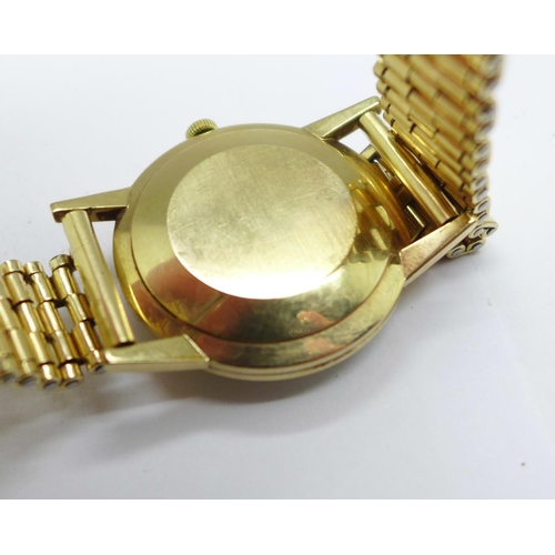 1111 - A 9ct gold cased Excalibur automatic wristwatch, (Tissot 1481 movement), rolled gold bracelet