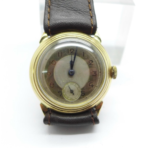 1114 - A 9ct gold cased wristwatch, the screw back case bears inscription dated 1945, 29mm case