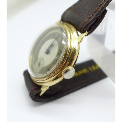 1114 - A 9ct gold cased wristwatch, the screw back case bears inscription dated 1945, 29mm case