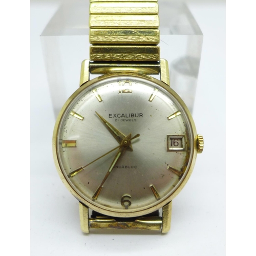 1121 - A 9ct gold cased Excalibur wristwatch