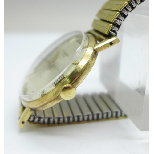 1121 - A 9ct gold cased Excalibur wristwatch