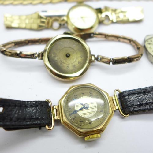 1124 - A lady's 9ct gold wristwatch with hexagonal shaped case, a Tissot wristwatch, two movements, etc.