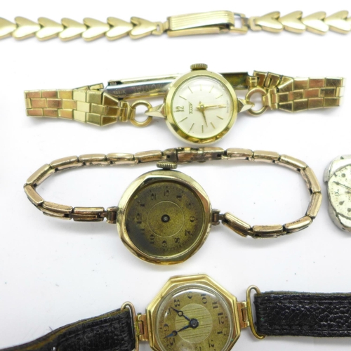 1124 - A lady's 9ct gold wristwatch with hexagonal shaped case, a Tissot wristwatch, two movements, etc.