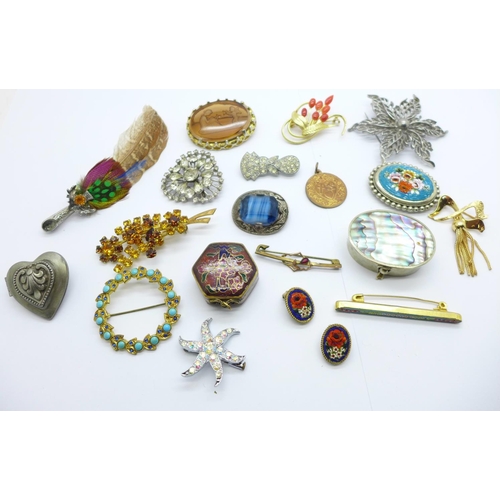 1138 - Fifteen brooches, two pill boxes, a pair of earrings and a pendant