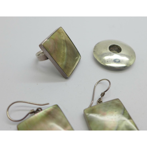 1141 - A pair of silver earrings and a matching ring, K/L, other silver jewellery including a cross, two ri... 