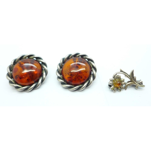 1146 - A pair of silver and amber earrings and a small brooch