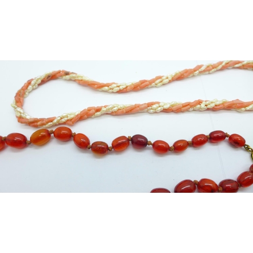 1148 - A coral and pearl necklace, one other necklace and an amber coloured bracelet