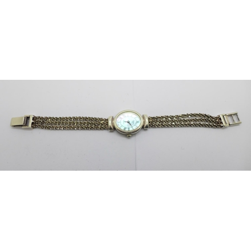 1153 - A silver wristwatch with mother of pearl dial