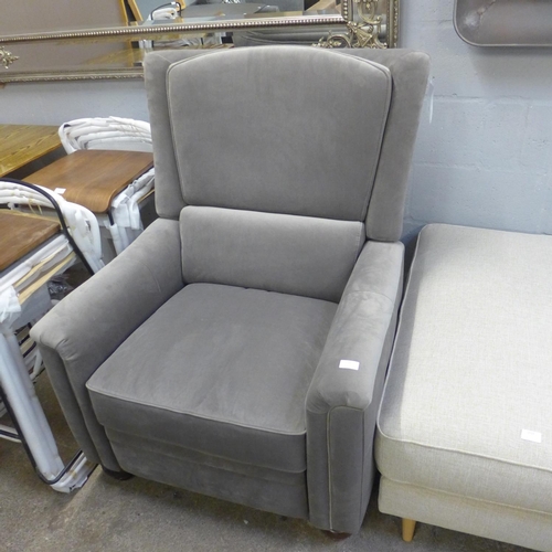 1580 - A grey velvet push back wing chair * This lot is subject to VAT