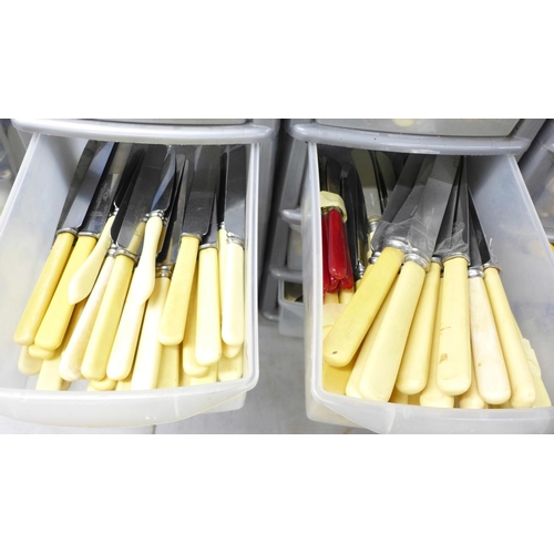 1185 - Two sets of plastic drawers with mixed cutlery and a collection of knives and knife sharpeners**PLEA... 