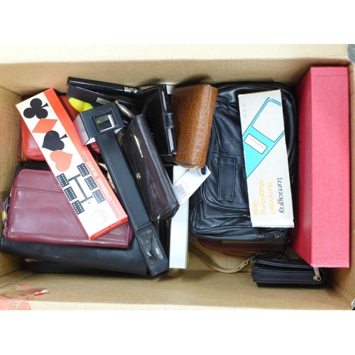 1210 - A box of wallets, organisers, Bridge playing cards, magnifying glasses, etc. **PLEASE NOTE THIS LOT ... 