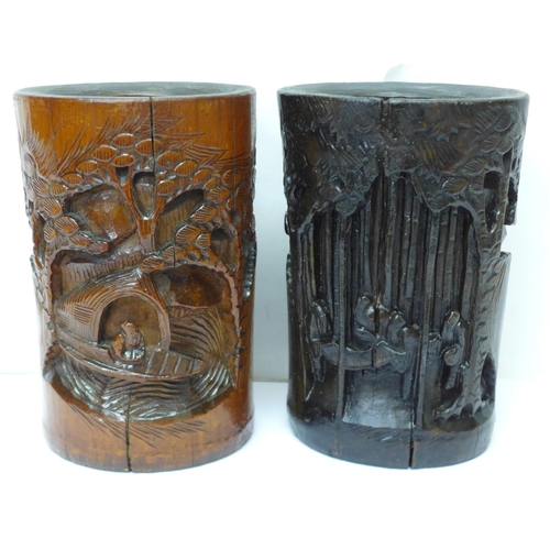 603 - Two Chinese carved bamboo brush pots, one stained, 20cm