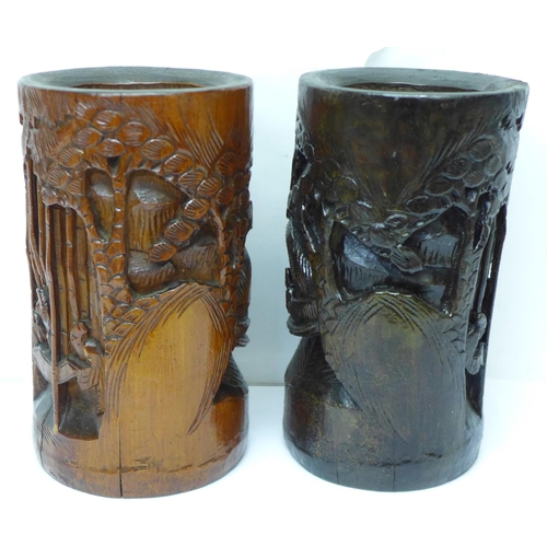 603 - Two Chinese carved bamboo brush pots, one stained, 20cm