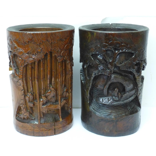 603 - Two Chinese carved bamboo brush pots, one stained, 20cm