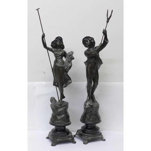 607 - A pair of spelter figures, farm girl and boy, 39.5cm