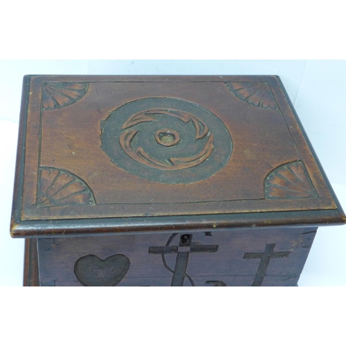 611 - A wooden box with Faith, Hope and Charity carvings