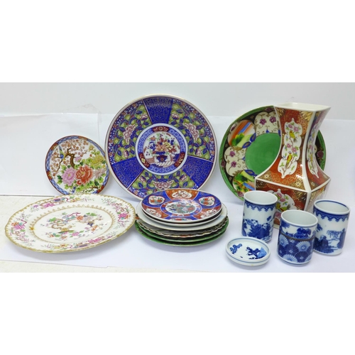 616 - Oriental pottery including three blue and white pots and dish, (two signed on the base) and a vase, ... 