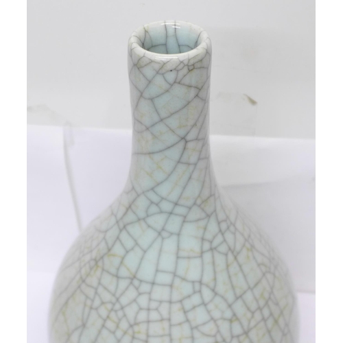 630 - A large Chinese Guan ware celadon crackle glaze bottle vase, 38cm