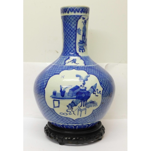 632 - A Chinese blue and white bottle vase, six character mark to the base, a/f crack on the 'neck', with ... 