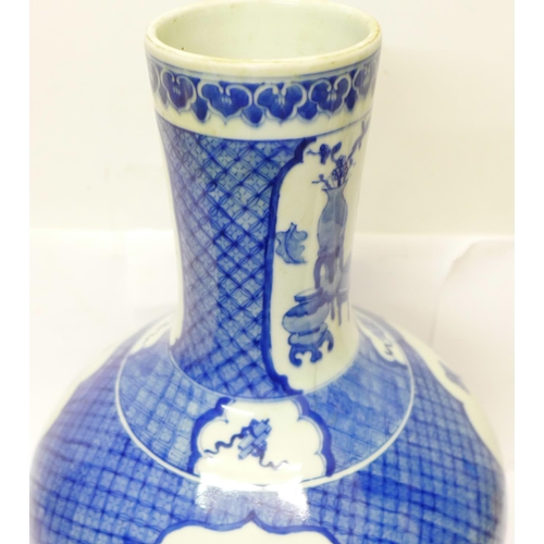 632 - A Chinese blue and white bottle vase, six character mark to the base, a/f crack on the 'neck', with ... 