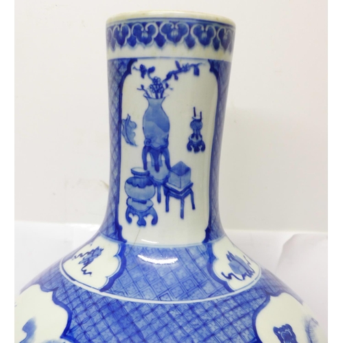 632 - A Chinese blue and white bottle vase, six character mark to the base, a/f crack on the 'neck', with ... 