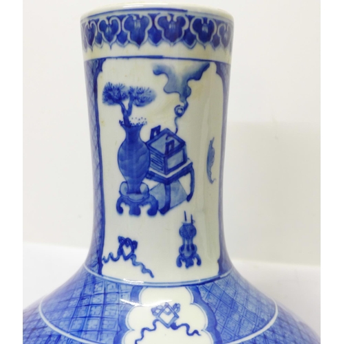 632 - A Chinese blue and white bottle vase, six character mark to the base, a/f crack on the 'neck', with ... 