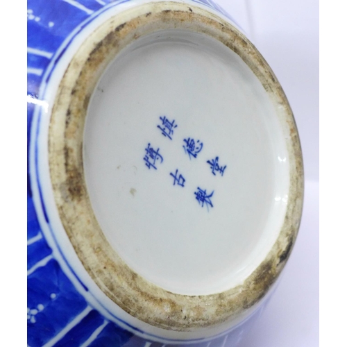 632 - A Chinese blue and white bottle vase, six character mark to the base, a/f crack on the 'neck', with ... 