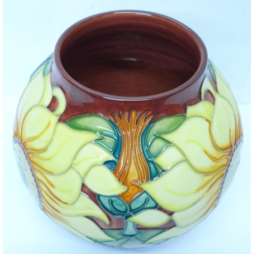 634 - A Moorcroft sunflower globular vase, dated '94, 17cm