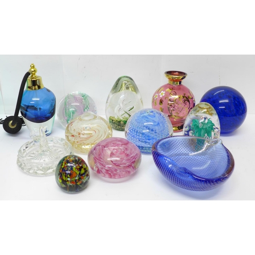 636 - Eight glass paperweights and other glassware including a scent bottle, vase and a dish, etc.