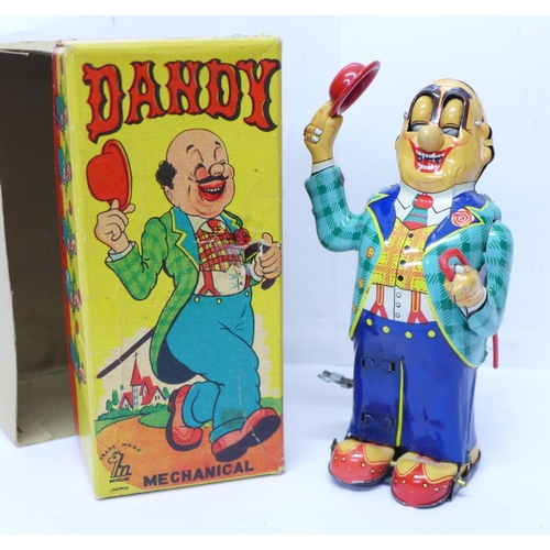 641 - A Mikuni tin-plate clockwork toy, Dandy Mechanical, made in Japan, 15cm, boxed