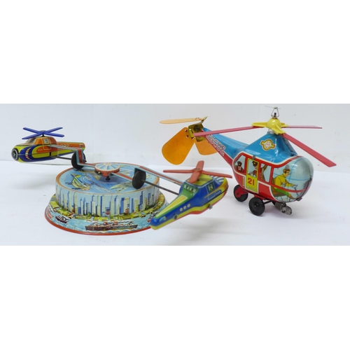 646 - A tin-plate clockwork helicopter toy, made in Western Germany, and one other tin-plate clockwork toy... 