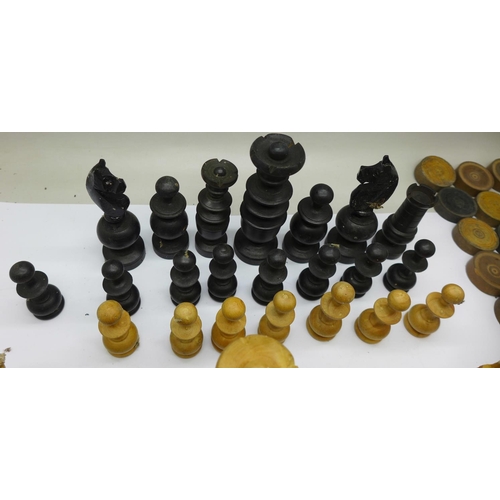 650 - Chess and draughts pieces, incomplete sets