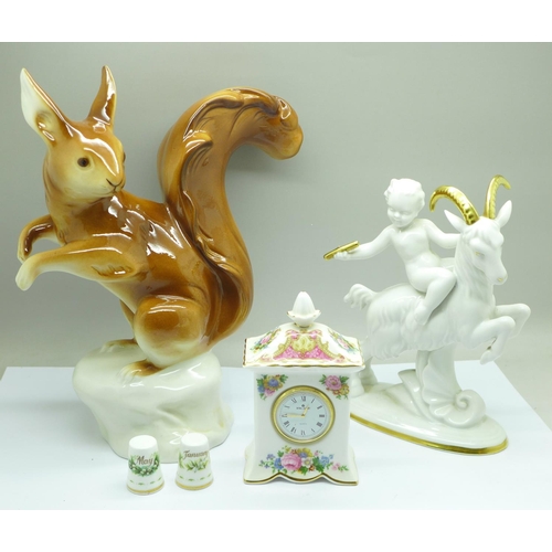 656 - A Royal Dux model squirrel, a Gerold porcelain Bavarian figure of a goat, a Royal Albert clock, boxe... 