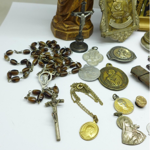 659 - A collection of religious items including Rosary, medallions, figure, miniature travel figure, Holy ... 